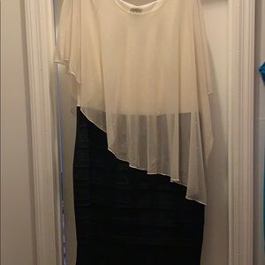 black and cream colored dress